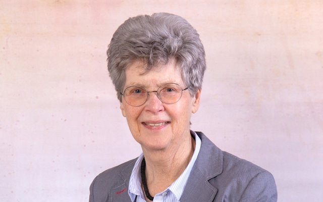 Dr. Melanie Sully, Politologin